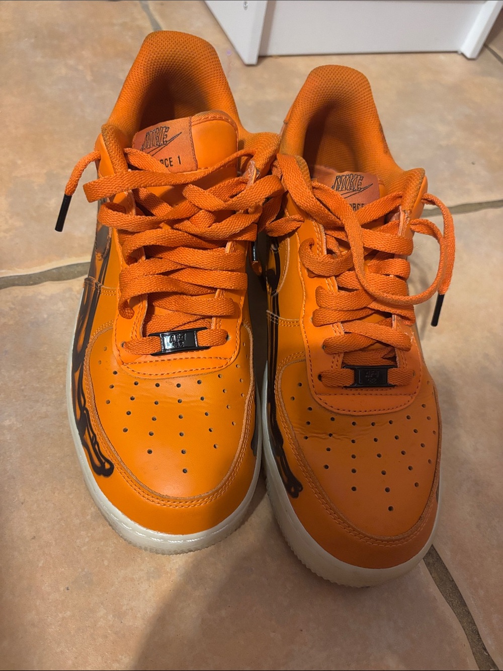 Nike Men’s Orange Low-Top Sneakers with Black Accent